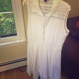 Crisp white halter dress.